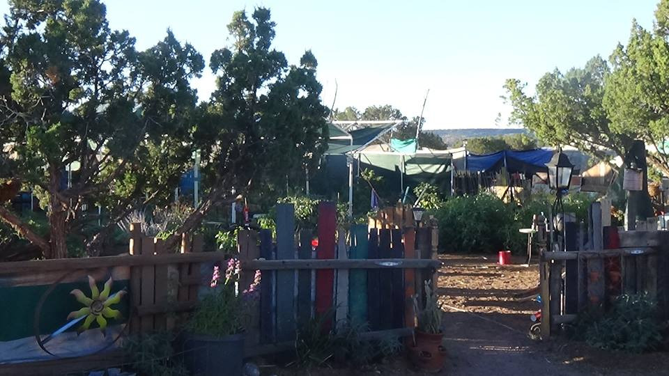 Garden entrance with folk-art fence